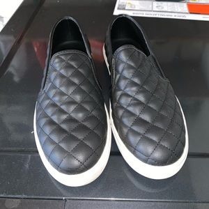 Steve Madden black slip ons